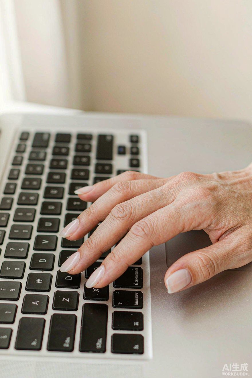Short natural square milky white nails typing on a laptop
