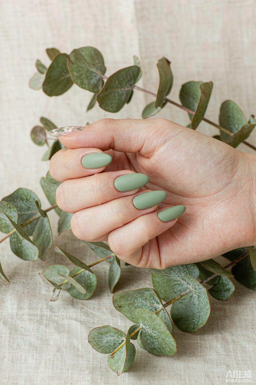 Sage green matte short almond nails with eucalyptus